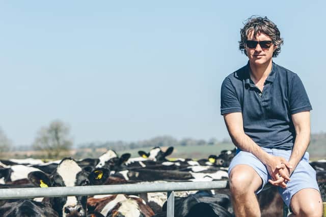 Jack Martin with his cows at his business Tom Parker Creamery in Exton. Picture by Alex Lawrence.