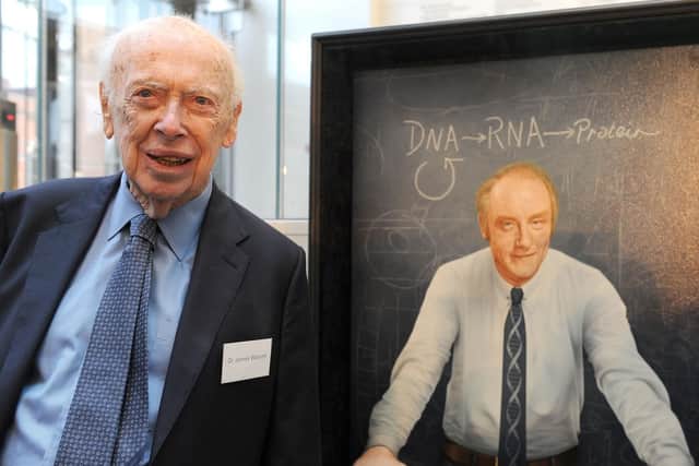 Dr James Watson, the American molecular biologist best known as one of the co-discoverers of the structure of DNA in 1953, with Francis Crick, stands next to a portrait of his former colleague during the official opening of the Francis Crick Institute in central London. Picture: Nick Ansell