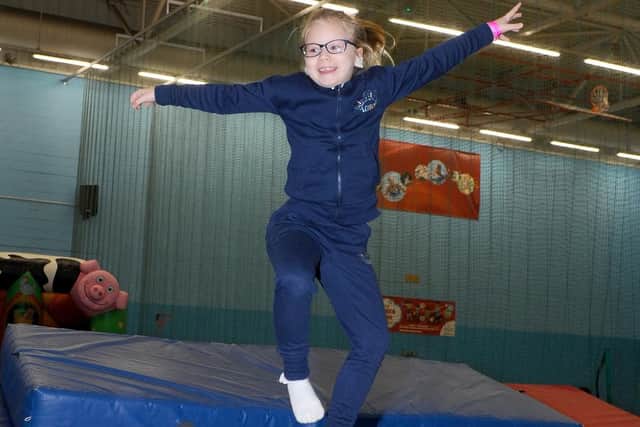 Children from Wallisdean Infant School in Fareham, had a go at a trampolining session in Fareham on Tuesday January 15, as part of Everyone Active Leisure Centre sponsoring a school each month. Pictured is: Nola Erdelja (7). Picture: Sarah Standing (150119-6072)