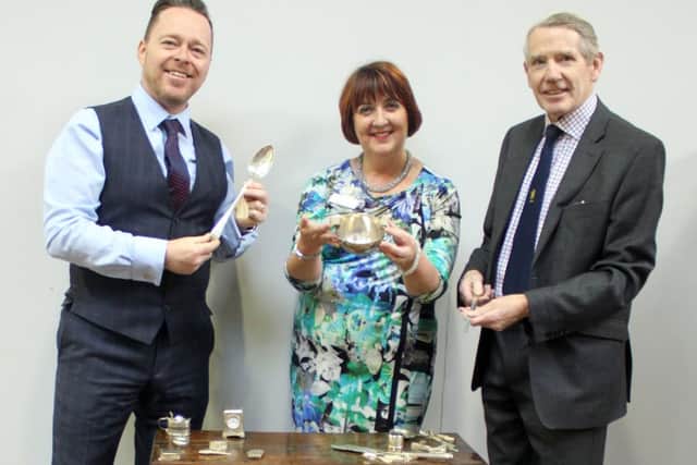 Rowans Hospice chief executive Ruth White with David Nesbit (right) and John Cameron from Nesbits