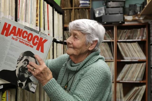 Joan Adams in the record library. Angel Radio, Havant.