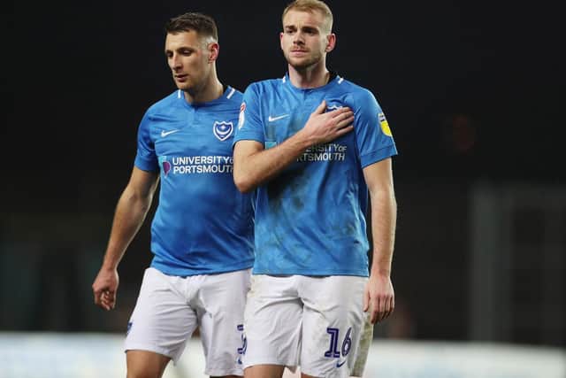 Players and fans are downcast after Oxford defeat. Picture: Joe Pepler