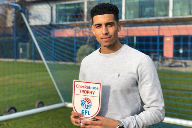 Louis Dennis with his Checkatrade Trophy award