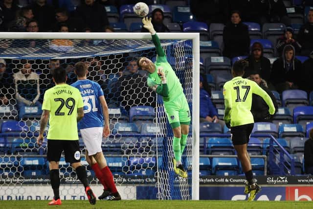 Craig MacGillivray makes a save against Peterborough. Picture: Joe Pepler