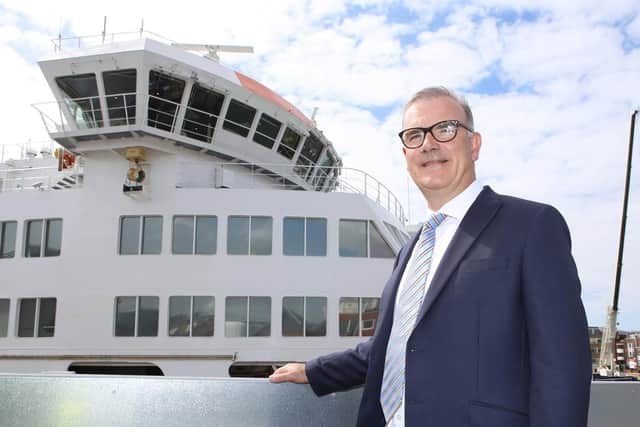 Kieth Greenfield in front of the Victoria of Wight ferry before the ship's inaugural journey.