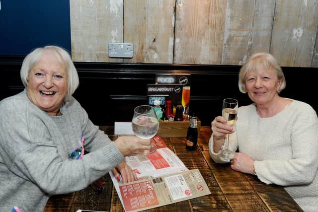 Jackie Gleaves, left, celebrating her 64th birthday with friend Jenny Christie, both from Southsea.
Picture: Sarah Standing (240119-6980)