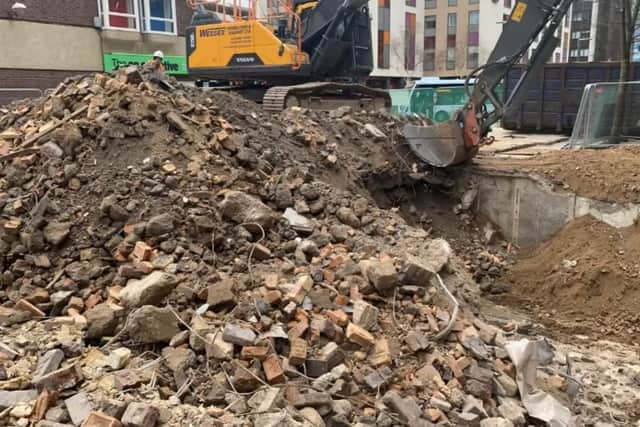 Demolition of Drift bar reveals newly lit war memorial