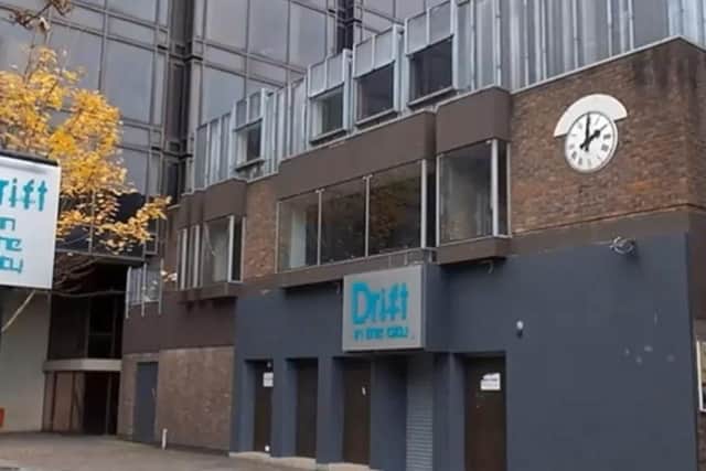 Demolition of Drift bar reveals newly lit war memorial