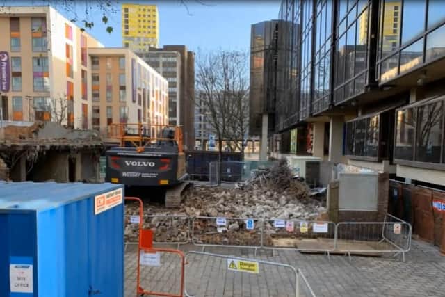 Demolition of Drift bar reveals newly lit war memorial