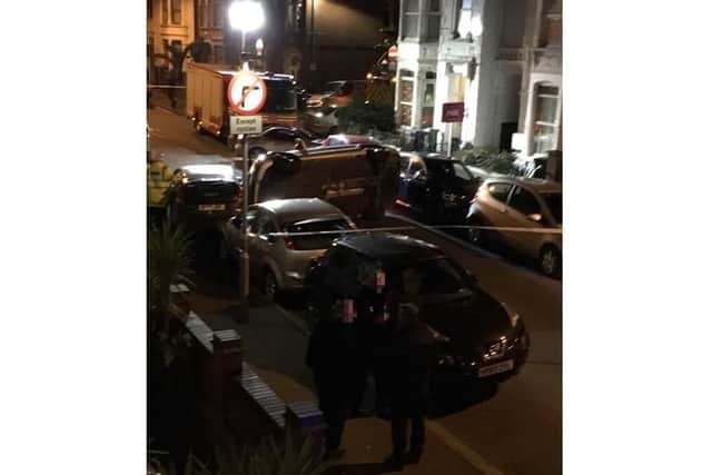 The Mercedes on its side after the crash in Gladys Avenue, North End, Portsmouth, last night (Sunday, January 27)
