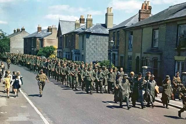 A rare colour photo of G prisoners of war being marched through Grove Road in Gosport to the detention centre in June 1944 just after D-day. Photo credit: Galerie Bilderwelt