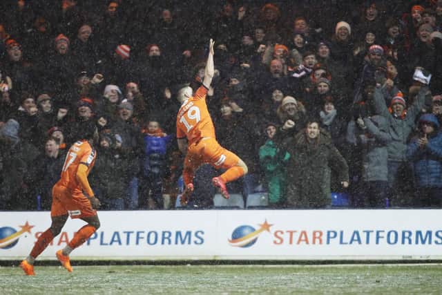 James Collins celebrates netting against Pompey
