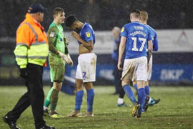 Pompey dejected after suffering defeat at Luton. Picture: Joe Pepler