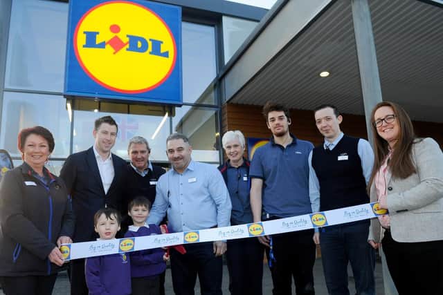 (l-r) Lorraine Reynolds, John Blackmore, Grant Page, Zeki Meydan, store manager, Helena Hayden, Samual Leach, Adam Reeves and Georgie Price, with (front l-r) Joseph Clarke (4) and Harry Clarke (6) from Whiteley. 

Picture: Sarah Standing (310119-7740)