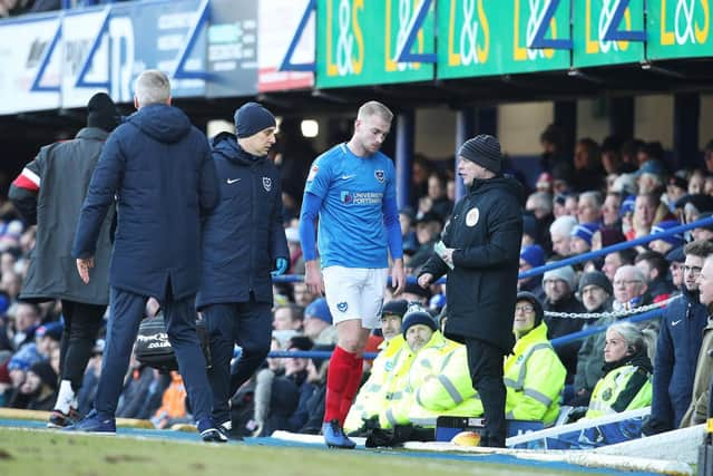 Jack Whatmough limps off against Doncaster. Picture: Joe Pepler