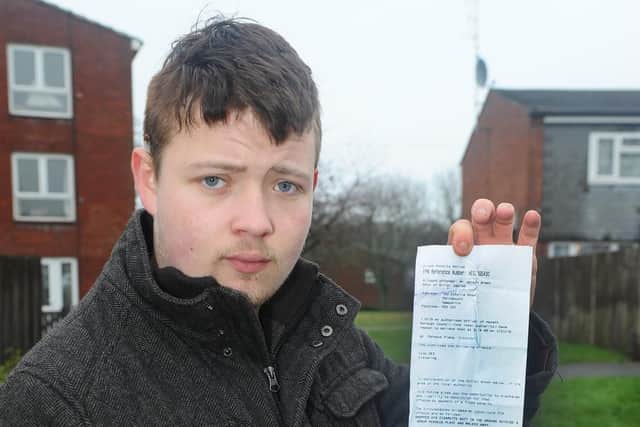 Jordon Green, from Crookhorn, with the fixed penalty notice he was handed by a Havant Borough Council enforcement officer. Picture: Sarah Standing (050219-8466)