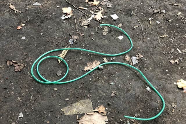 The rubber cable which police sources suspect was used as a tourniquet by drug addicts taking heroin