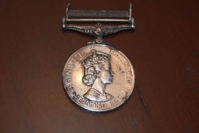 A close-up of Frank Money's Borneo campaign medal
