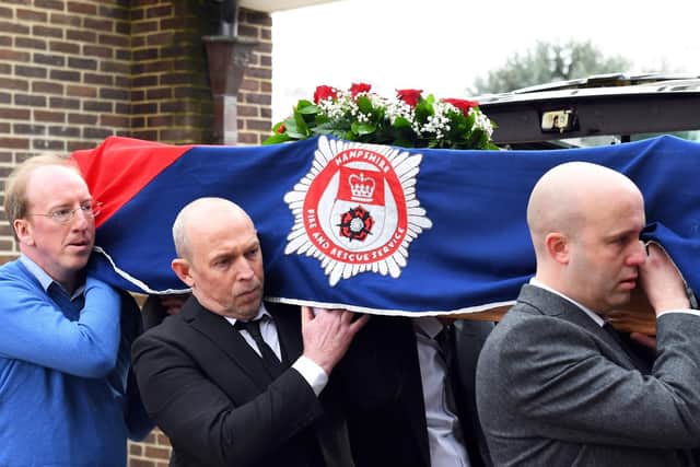 The coffin is carried into the crematorium
Picture: Malcolm Wells (190206-3509)