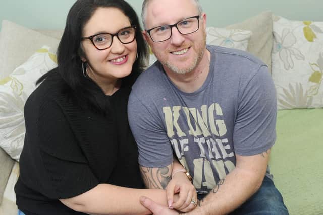 Emily Warden (34) from Hilsea, has written a journal called This Is Me along with other ladies, who have used the Wessex Cancer Trust local support centre in Cosham. Emily was diagnosed with womb cancer in 2016 when she was thirty-one.Pictured is: Emily Warden (34) with her husband Mike (39).Picture: Sarah Standing (070219-8697)