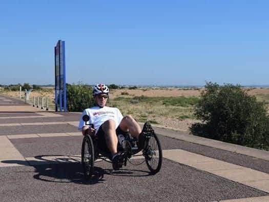 Leading hand Johnathon Bulleyment, using the trike which was funded for him thanks to a collaboration between the Royal Navy and Royal Marines Charity and Help For Heroes