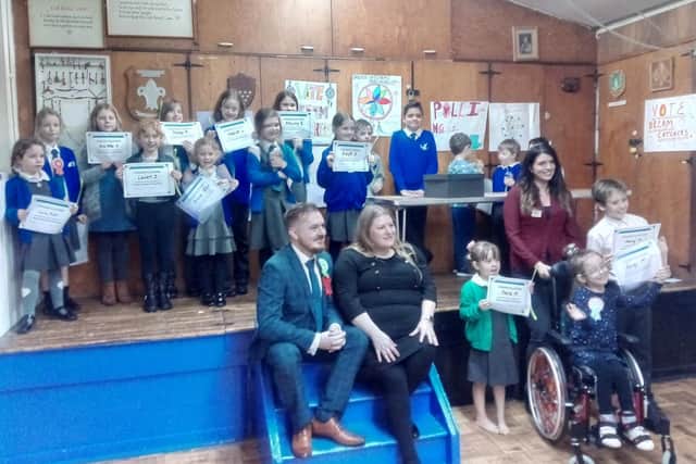 Terry Norton and Councillor Donna Jones (centre), Caroline Brennan (far right) alongside successful candidates elected for the Children's Parliament.