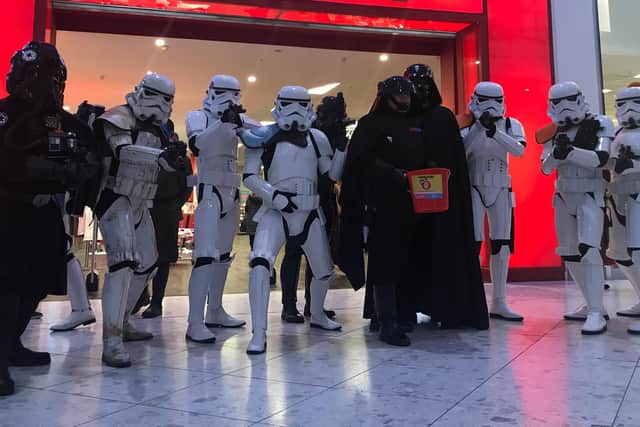 Star Wars characters gathered outside TK Maxx as part of a visit to Cascades Shopping Centre in Portsmouth to raise money for Comic Relief. Picture: Byron Melton