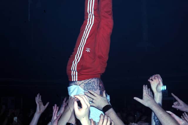 Frank Carter pulls a handstand in the crowd at The Wedgewood Rooms, Southsea, on February 8, 2019. Picture Paul Windsor
