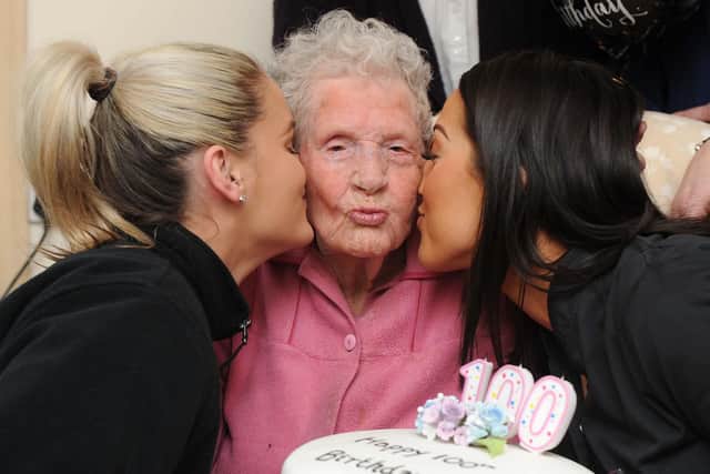 Dorothy Aslett celebrating her 100th birthday with Lalys staff, Dolly-May Fry and Lola Thomson.  Picture : Habibur Rahman