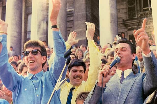 Mick Kennedy takes the microphone at the promotion celebrations