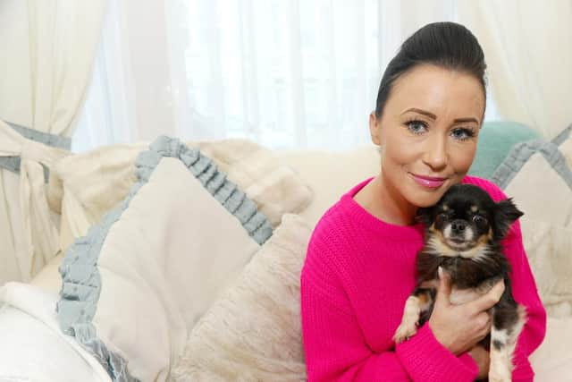 Laura Lane (38) back home with her dog Lily the Chihuahua.

Picture: Sarah Standing (110219-9026)