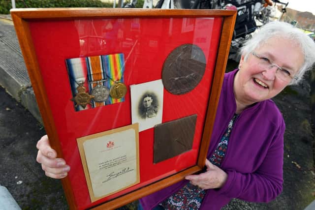 Myra Jones from Titchfield Common with the framed medals and honours of her great-uncle Richard William Thouless who was serving in The Royal Berkshire Regiment and died on the first day of The Battle of The Somme aged 21 
Picture: Malcolm Wells (190213-8072)