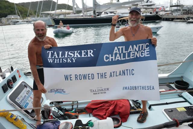 Neil Young and Peter Ketley celebrate after arriving in Antigua. Picture: Atlantic Campaigns