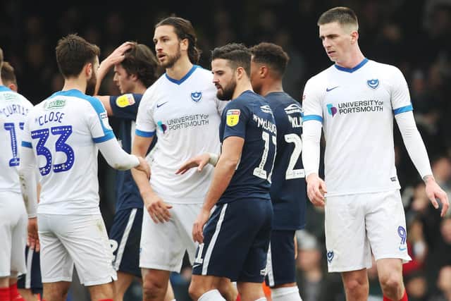 The Pompey players look dejected at the final whistle