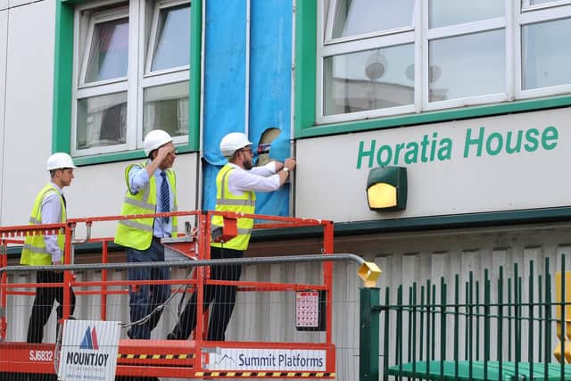 Cladding being removed from Horatia House in 2017