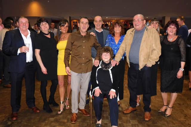 Norma with nine of her children.