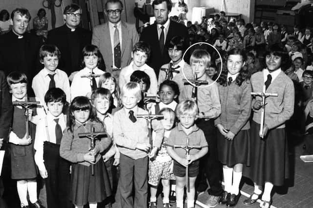 Children at St Edmunds School in Arundel Street, Portsmouth. The third person in from the right, past the girls, holding a cross is Lawrence Clark's son Laurie, who was about eight at the time, around 1979/1980.