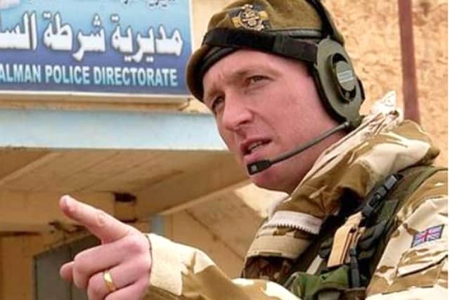 Lt Col (retired) Chris Parker in Iraq. He was used to be in the Princess of Wales's Royal Regiment. He is now the chairman of the Princess of Wales's Royal Regiment Association. He grew up in Cowplain and was born in Chichester.