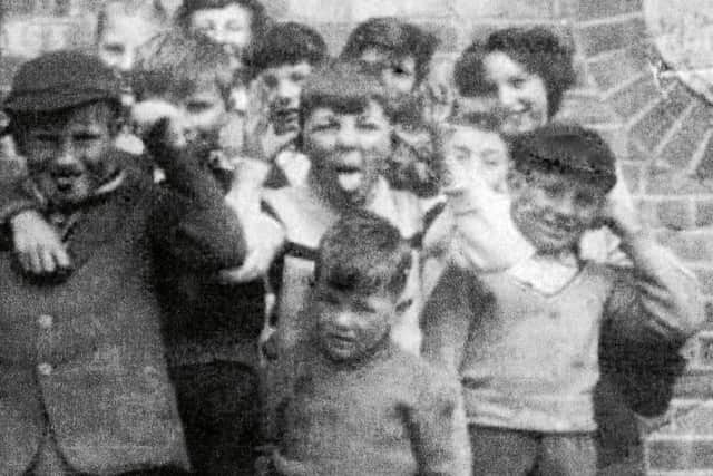 They may look like the Beanos Bash Street Kids but they are in fact boys and girls from Petersfield House flats, in Landport in the 1960s. The photo belongs to Lawrence Clark who is in a hat at the front.