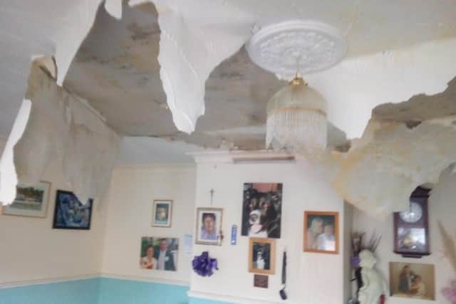 Raymond Branson's living room after his property was badly damaged by floodwater from his immersion tank