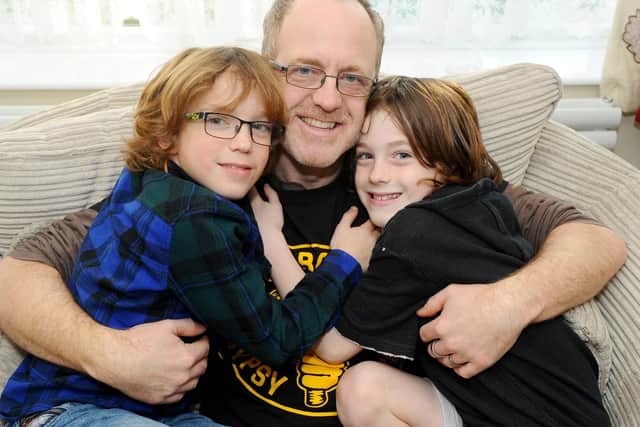 Bedenham Primary School teacher Jonathan Pearce with his twin boys Finn and Oscar, both eight. Picture: Sarah Standing (150219-9382)