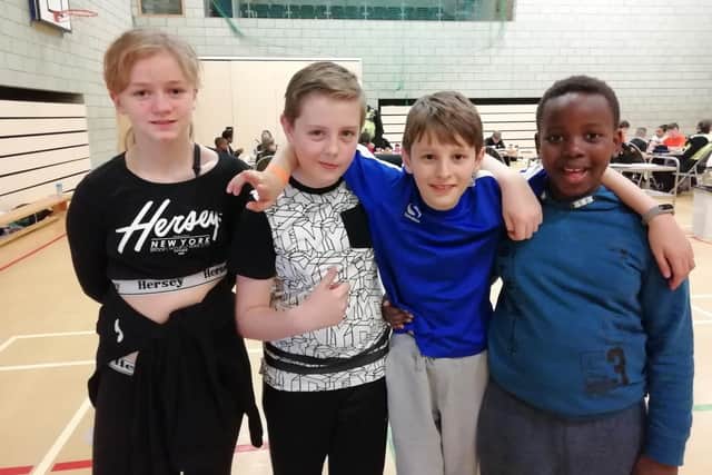 From left, Demi Jones (10), Leon White (11), Samuel Barker (10) and Elijah Sengu (9)