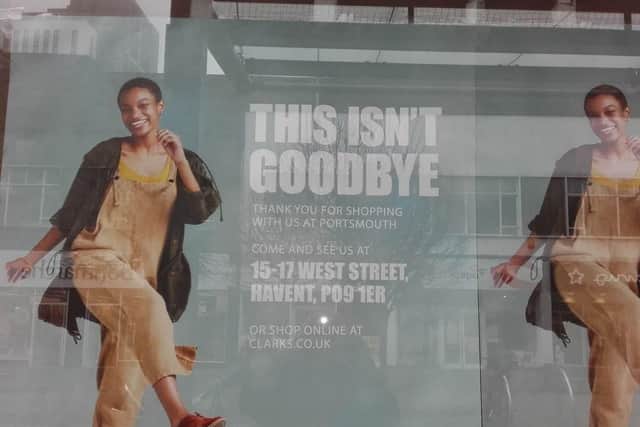 The poster in the window of the former Clarks store in Arundel Street.