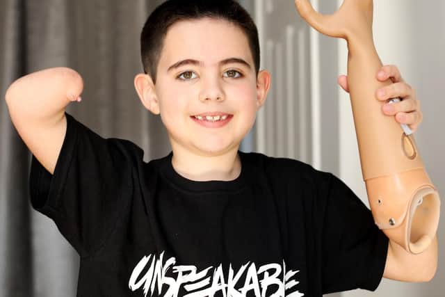 Evan Joice, 8, of Gosport, has been fitted with a prosthetic arm.         Picture: Chris Moorhouse