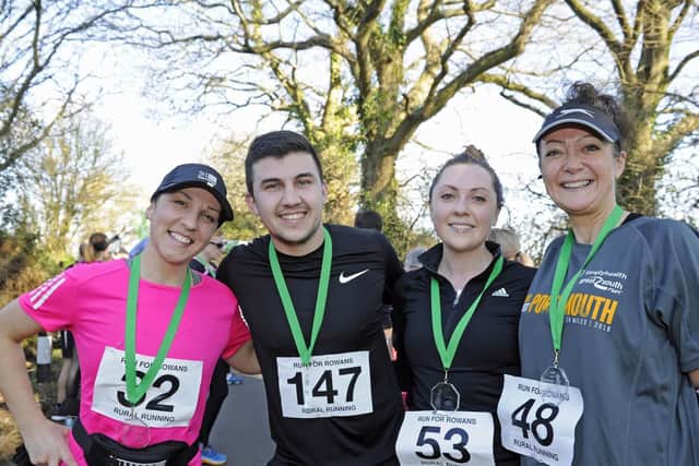 Competitors have taken part in a 5K running race in Wickham to raise money for The Rowans Hospice. (l to r) Sarah Keteku, Louis Brew, Lilly Seabrook and Jane Pollard.Picture: Ian Hargreaves  (240219-6)