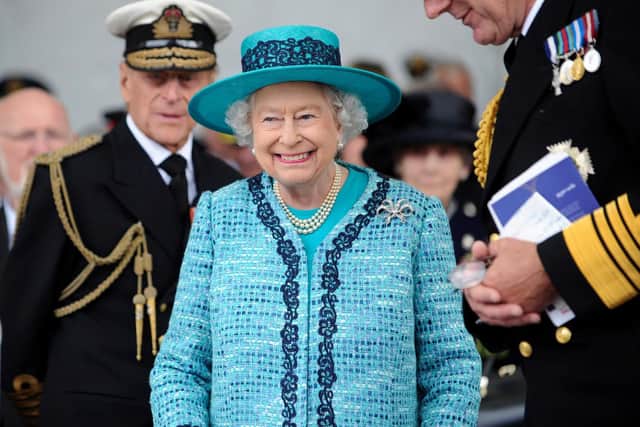 Her Royal Highness Queen Elizabeth II officially named HMS Queen Elizabeth during a ceremony in Rosyth in 2014. She is not however named after the current UK monarch, instead getting her name from Elizabeth I. Picture: CPOA(Phot) Thomas Tam McDonald