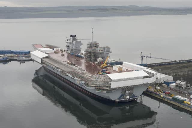 HMS Queen Elizabeth finally takes to the water, however she is still under construction. Picture: Andrew Linnett/ MoD