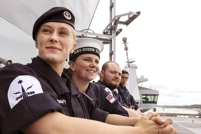 HMS Queen Elizabeth set sail on June 26, 2017, from Rosyth to begin contractor sea trials after nearly a decade under construction. Pictured are Able Seaman (AB) Natasha Elford, AB Layton Toward and AB Richard Mead. Picture: Royal Navy