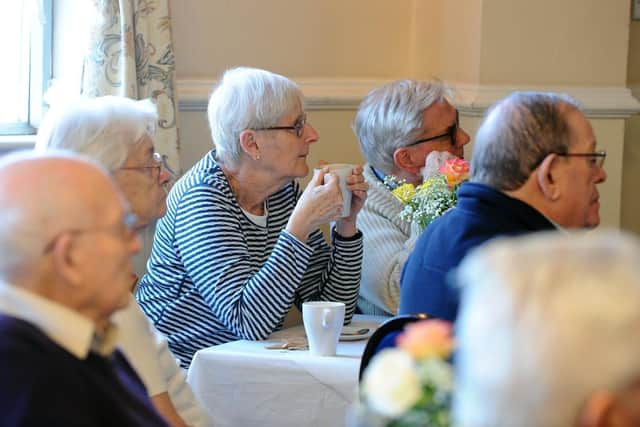 Hayling Island residents watch on as IT professional Cllr John Perry speaks at the scam awareness meeting held at the Bridge Centre, on Hayling Island, on Monday afternoon. Picture: Sarah Standing (250219-9959)