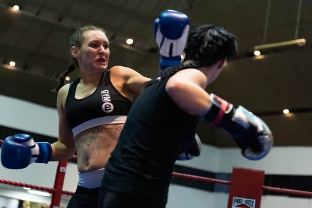 Chantelle Knight on her way to victory over Harli-Lee Etheridge. Picture: Duncan Shepherd